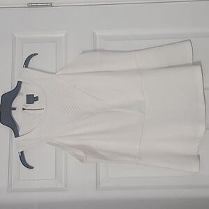 Elegant White Sleeveless Shirt
